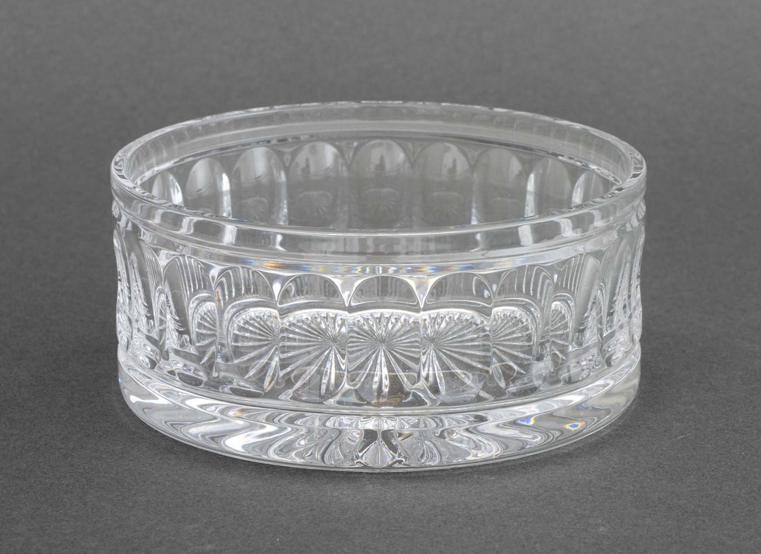 Ralph Lauren Cut Crystal Wine Bottle Coaster: Ralph Lauren Cut Crystal Wine Bottle Coaster, etch marked "Ralph Lauren" and "Hand Made Hand Cut / Made in Hungary" label to underside, with original navy blue box. 2.25" H x 5" Diameter. Provenance: