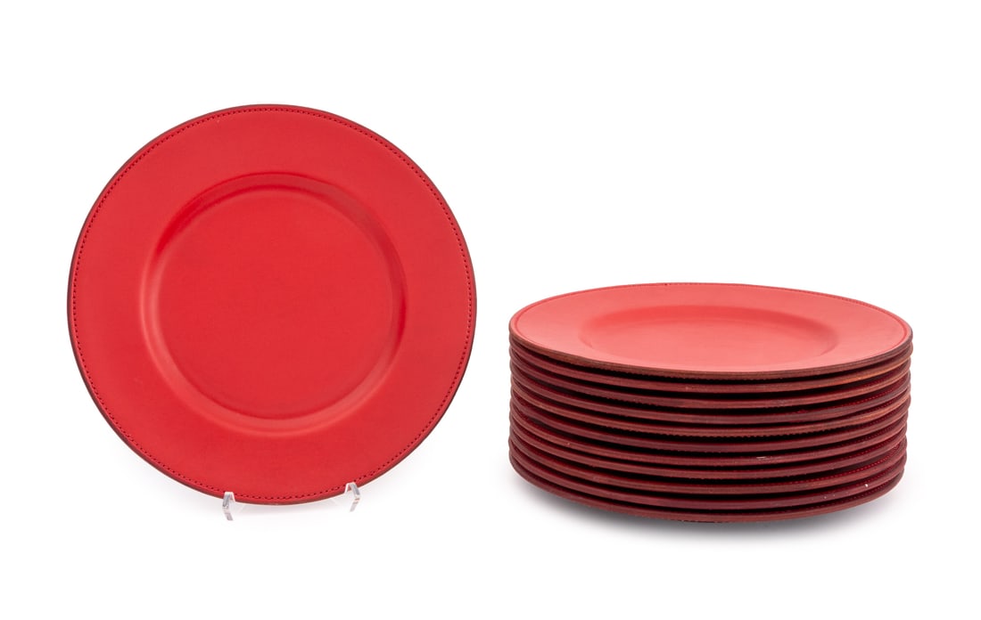Ralph Lauren "Rollins" Red Leather Chargers, 12: Set of 12 Ralph Lauren "Rollins" Red Leather Chargers, marked "Ralph Lauren / Rollins" to the undersides. 13.75" Diameter. Provenance: From a Long Island Estate. Keywords: Designer, American design, S