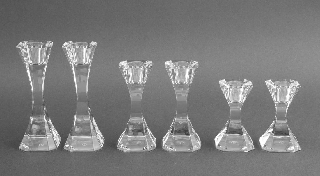 Villeroy & Boch Glass Graduated Candlesticks, 6: Set of Six Villeroy and Boch Glass Graduated Candlesticks, each marked. Tallest: 6.25" H x 2.25" W x 2.25" D. Provenance: From an 880 Fifth Avenue Collection. Keywords: Lighting, Designer, Candleholde