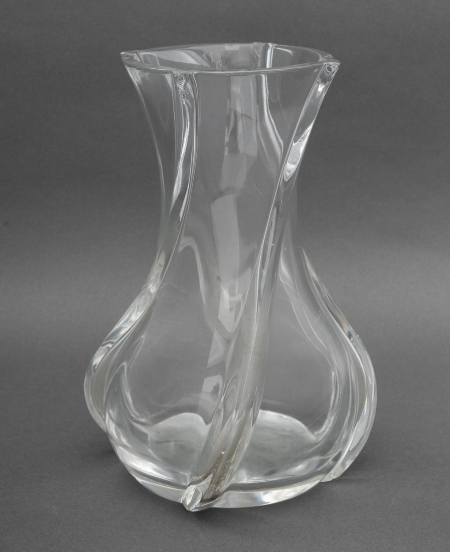 Baccarat "Serpentin" Crystal Vase: Baccarat "Serpentin" Crystal Vase, marked "Baccarat France" to underside. 10" H x 7" Diameter. Provenance: From a Long Island Estate. Keywords: Designer, French cristal, Luxury brand, Art Glass, Flowe