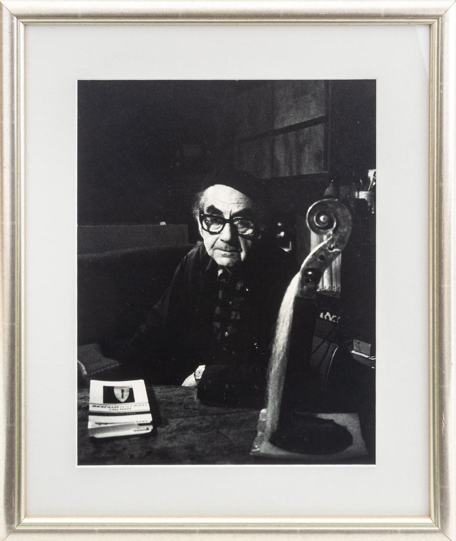 Renate Ponsold "Man Ray..." Silver Print, 1970: Renate Ponsold (American, 1935-2023), "Man Ray in His Paris Studio", Gelatin Silver Print, 1970, studio labels verso, silvered wood frame. Image: 13.25" H x 10.25" W; frame: 18.5" H x 15.5" W x 0.5" D