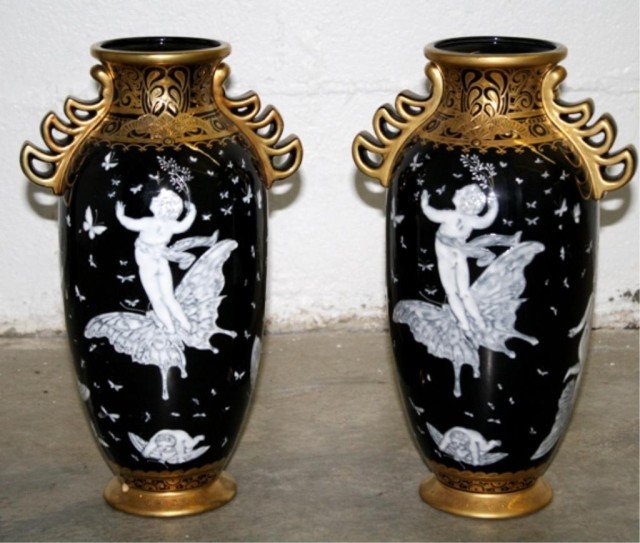 Pair of Minton Style Black & Gold Porcelain Vases: Pair of black and gold porcelain Minton style vases with butterflies; unmarked. Dimensions: 13"H x 8-1/2"W