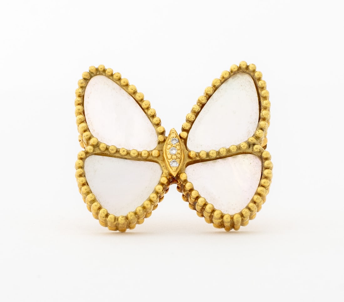 V.C.A. Style 18K Gold MOP Diamond Butterfly Brooch: Van Cleef & Arpels Style 18K Goold Mother-of-Pearl Diamond Butterfly Brooch, featuring four bezel set mother of pearl plaques approx. 15 x 9 - 12 x 10 mm., adorned with three pave set round brilliant