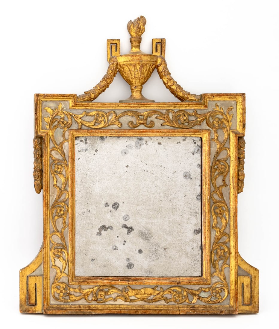 Louis XVI Painted Giltwood Mirror: Louis XVI Painted Giltwood Mirror, 18th century, with garland and urn crest, the frame with carved floral and scrollwork border and Greek key accents. Mirror plate: 13.25" H x 12" W; frame: 28.5" H x