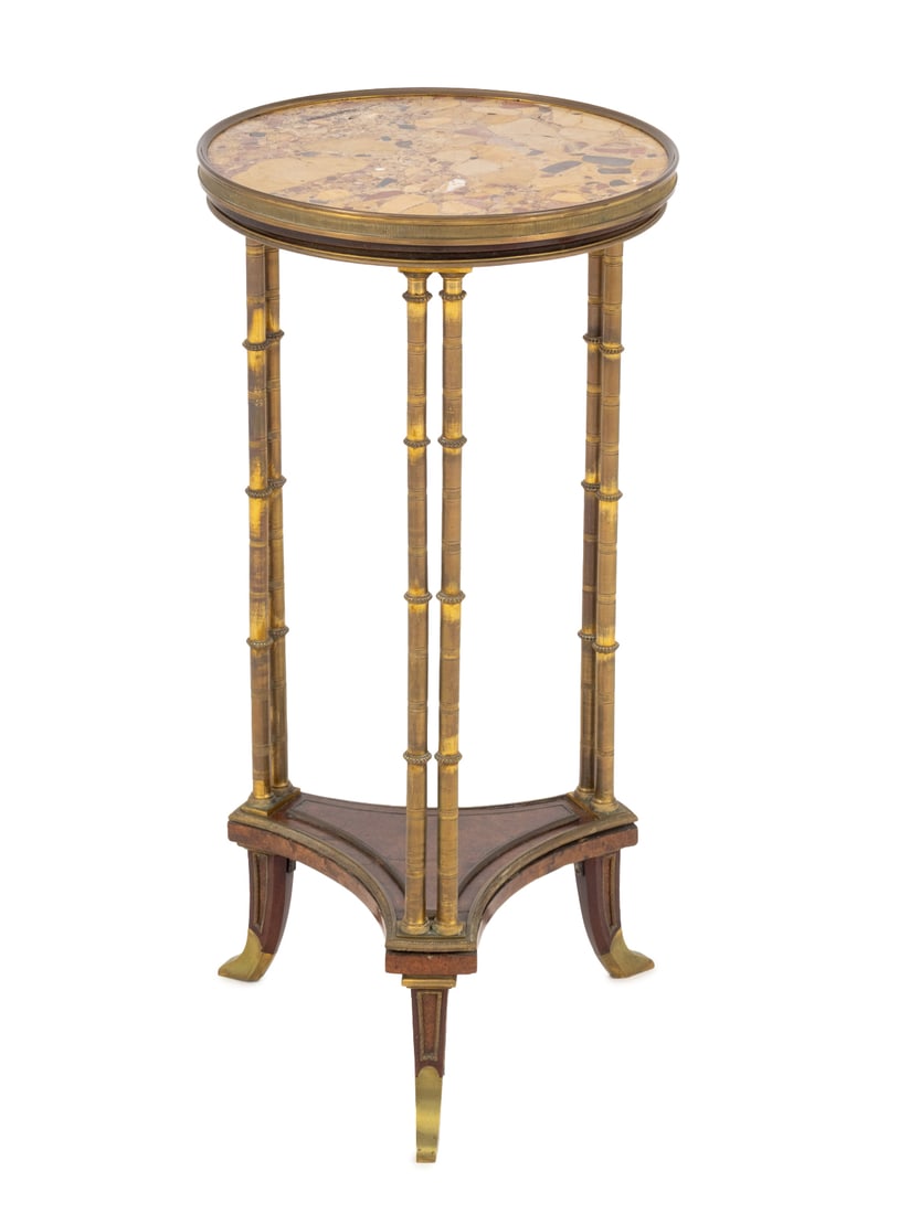 Louis XVI Style Gilt Metal and Mahogany Gueridon: Louis XVI Style Gilt Metal and Mahogany Gueridon, after the design by Adam Weisweiler, with breche d'alep marble top. 29.75" H x 14.25" Diameter. Provenance: Property from a Bunny Williams decorated 5