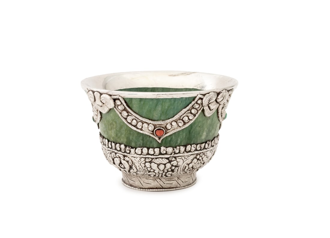 Tibetan Coral, Turquoise, Silver Mounted Jade Cup: Tibetan Coral, Turquoise, and Silver Mounted Jade Cup, with etched and repousse Buddhist symbol decoration. 2.5" H x 3.75" Diameter. Provenance: Property from a Bunny Williams decorated 5th Avenue Est
