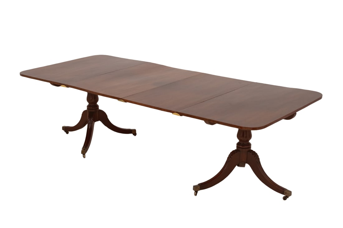 George III Mahogany Twin Pedestal Dining Table: George III Mahogany Twin Pedestal Dining Table, with two extension leaves. Closed: 28.5" H x 52.25" W x 44" D; extended: 99.75" W. Provenance: Property from a Bunny Williams decorated 5th Avenue Estat