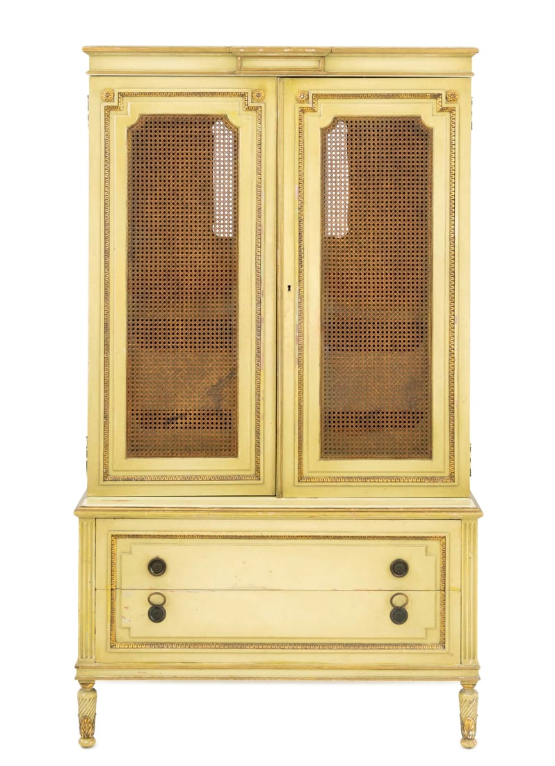 Louis XVI Style Gilt and Green Painted Linen Press: Louis XVI Style Gilt and Green Painted Linen Press, with two cane paneled doors opening to shelving above two drawers. 69" H x 40" W x 21.25" D. Provenance: Property from a Bunny Williams decorated 5t
