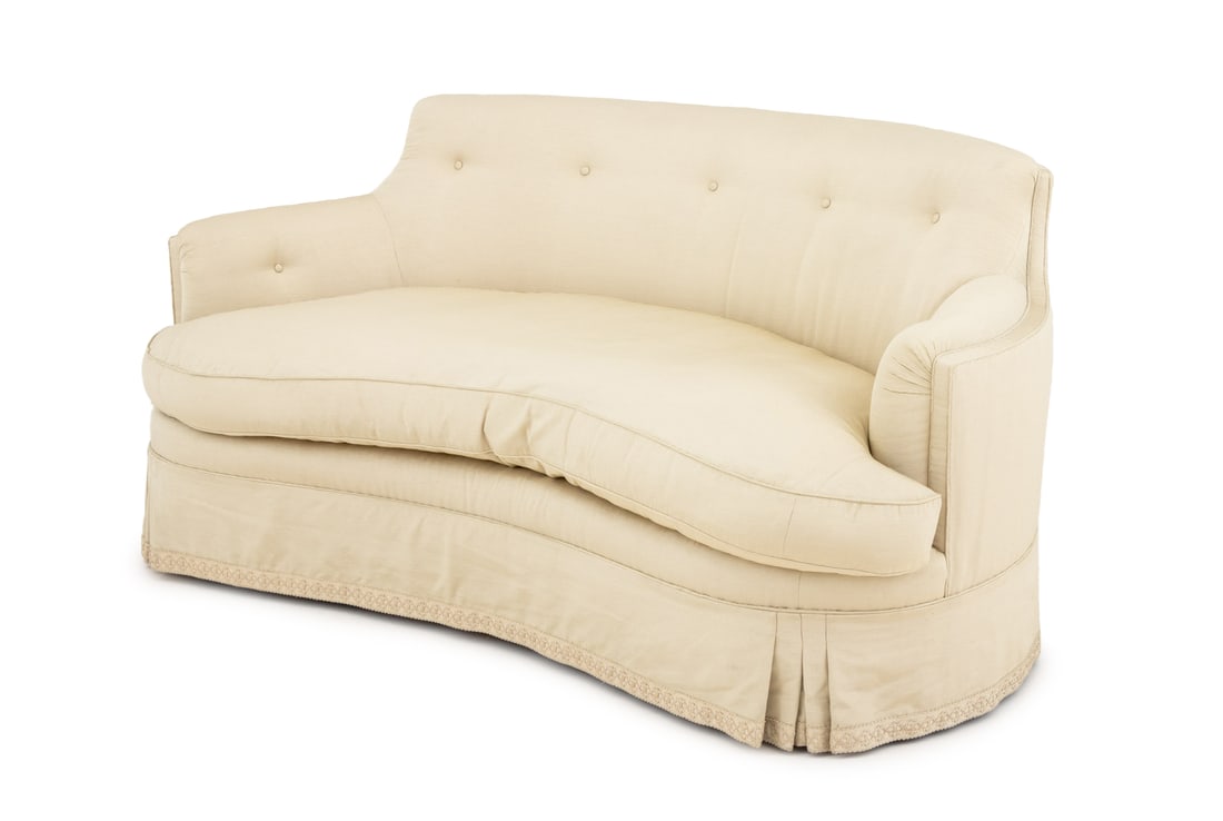 Modern White Silk Upholstered Kidney Shaped Sofa: Modern White Silk Upholstered Kidney Shaped Sofa, with button down back. 31" H x 66" W x 33" D; seat: 18.5" H. Provenance: Property from a Bunny Williams decorated 5th Avenue Estate. Keywords: Vintage