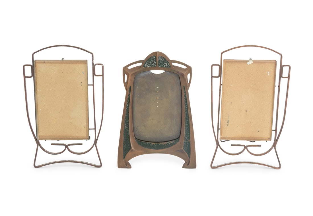 Art Nouveau Patinated Metal Picture Frames, 3: Group of Three Art Nouveau Patinated Metal Picture Frames, comprising: a pair of wrought iron geometric design frames with beveled glass, and an enameled copper frame with obscured mark to reverse. La
