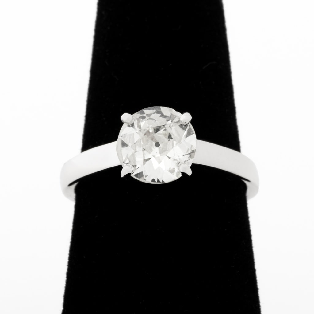 14K White Gold Diamond Solitaire Ring: 14K White Gold Solitaire Diamond Ring, featuring one prong set old European cut diamond, weighing approx. 1.35 carats, K color/ SI2 clarity. marked: "14K". Measuring approx. US size 6 3/4, 2.7 dwt.