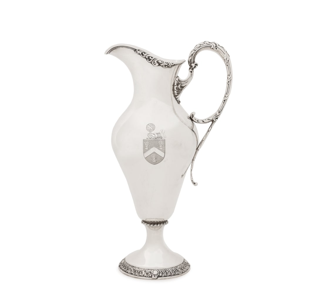 Theodore B. Starr Sterling Silver Footed Ewer: Theodore B. Starr Sterling Silver Footed Ewer, with scroll form handle and border to the circular base, engraved with family crest and "1907", marked "Theodore B. Starr / New York" and "Sterling /