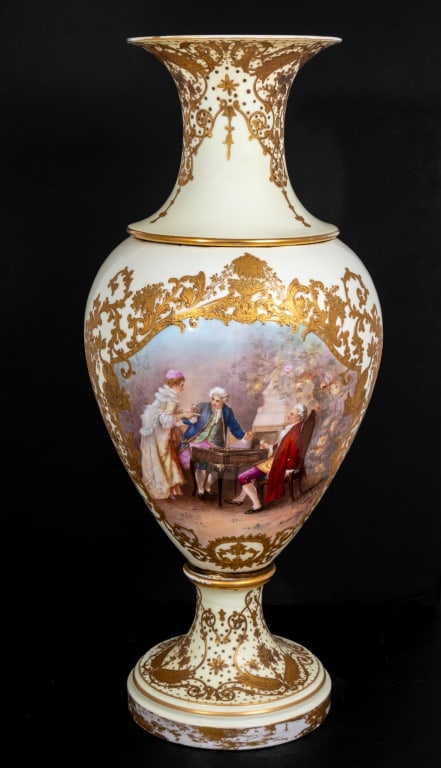 Sevres White Ground Ovoid Porcelain Vase: Sevres White Ground Ovoid Porcelain Vase, late 19th century, painted with figures in 18th century costume seated at a table drinking, and a floral bouquet, signed "A Soustre", within elaborately