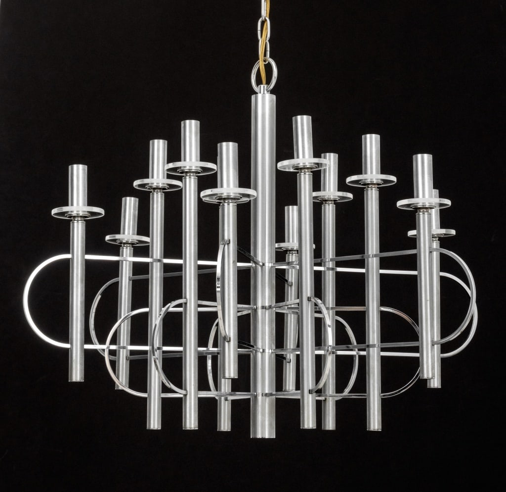Gaetano Sciolari 12-Light Chrome Chandelier, 1970s: Gaetano Sciolari Twelve-Light Chrome-Plated Chandelier, 1970s, with clear glass drip plates. 32" H x 27" Diameter. Provenance: From a Chappaqua, New York Collection. Keywords: Lighting, Ceiling light,