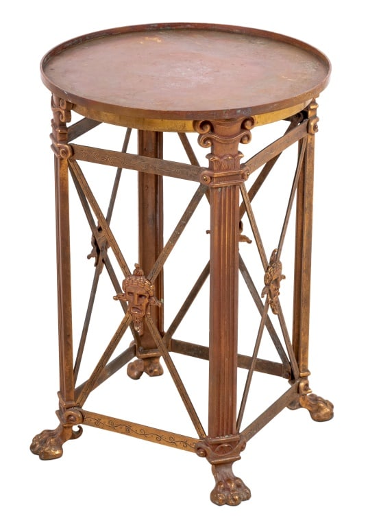 Roman Style Brass Circular Side Table: Roman Style Brass Circular Lamp Table, after the antique, 20th century, the circular dish top above cantered reeded legs, joined by cross supports, centered by masks, on paw feet. 22" H x 15.5" Diamet