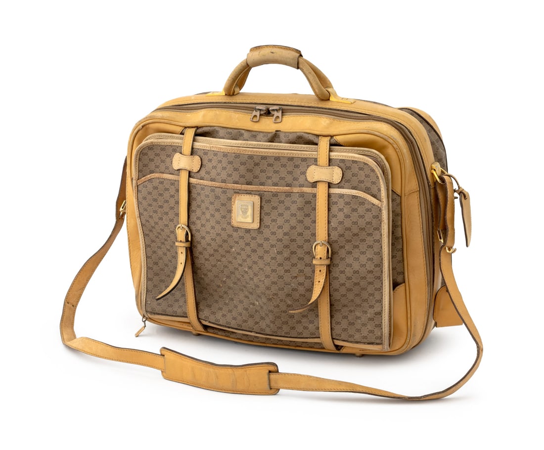 Gucci Monogrammed Canvas and Leather Boston Bag: Gucci Monogrammed Canvas and Leather Boston Travel Bag, the main case with top handle and shoulder strap, double strap to the front holding small carrying case with front pocket and zipper pocket, the