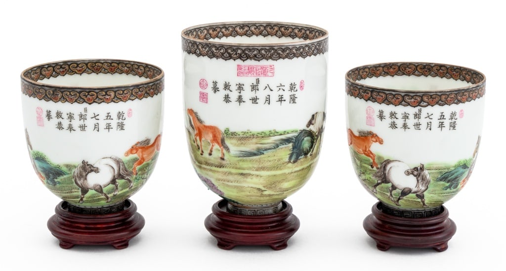 Chinese Famille Rose Eggshell Porcelain Vases, 3: Group of Three Chinese Famille Rose Eggshell Porcelain Diminutive Vases on Wood Stands, hand-painted with landscape scenes of horses, each with blue four character seal mark to underside. Tallest