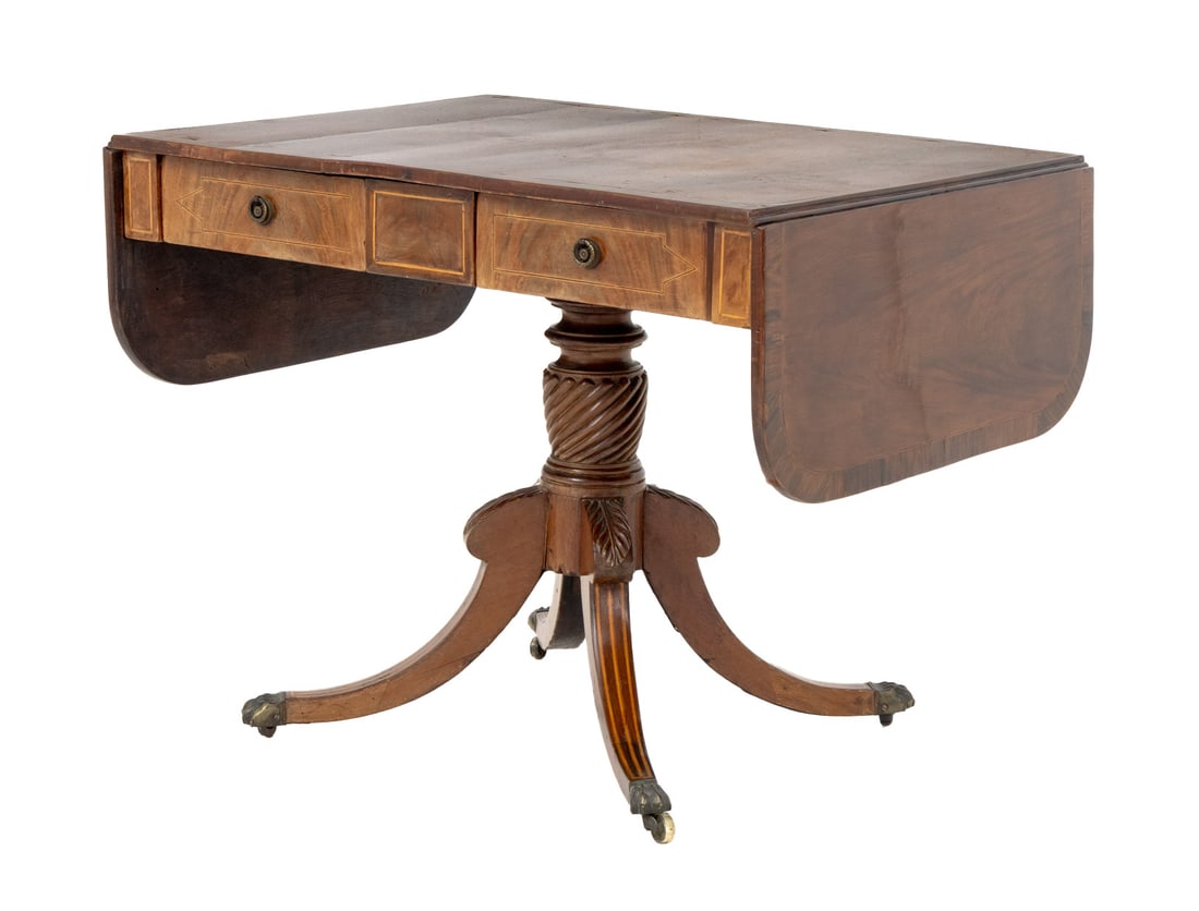 George III Style String Inlaid Mahogany Sofa Table: George III Style String Inlaid Mahogany Sofa Table, with two drop leaves and two drawers above four legs terminating in lion's paw feet above casters. Leaves dropped: 26.5" H x 35" W x 26" D; extended