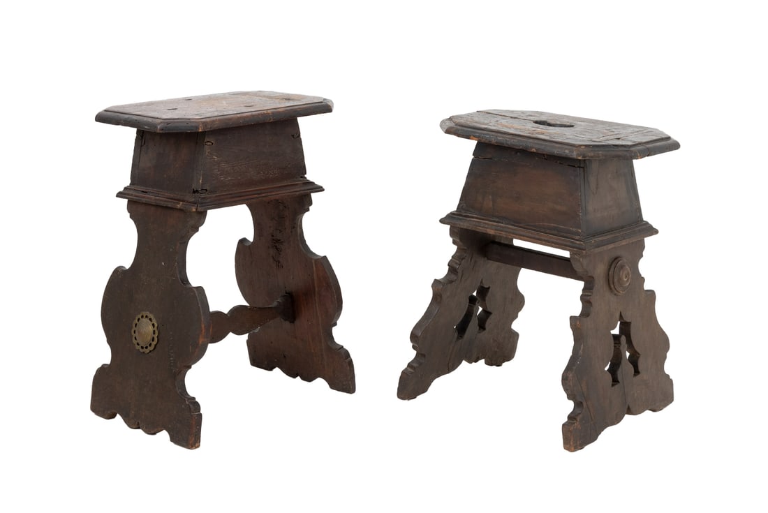 Renaissance Revival Walnut Stools, Pair: Assembled Pair of Renaissance Revival Carved Walnut Stools, each with rectangular canted corner tops above apron box with sgabello form supports on each, one with brass mounts attachments and each