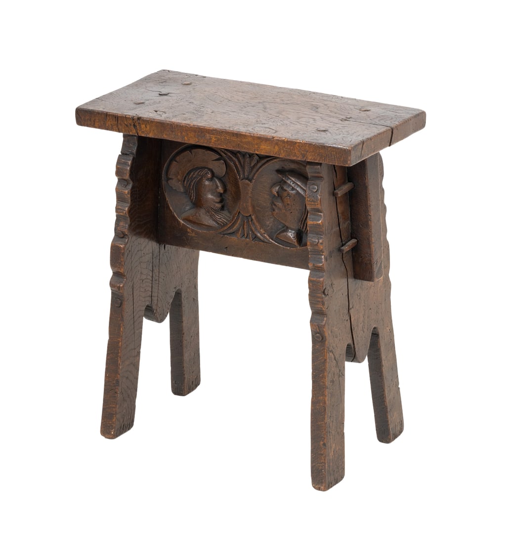 Renaissance Revival Oak Stool, 19th C.: English Renaissance Revival Oak Stool, early 19th century, with rectangular top above carved double-sided couple medallion portrait busts with two shaped supports. 22.5" H x 19.75" W x 10.75" D.