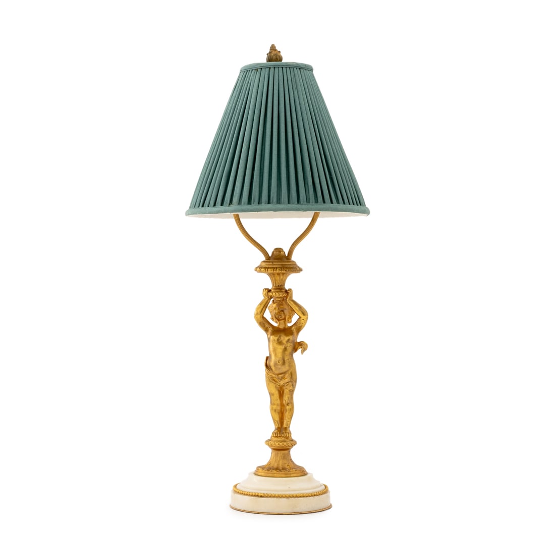 French Gilt Metal Cherub Form Table Lamp: French Gilt Metal Cherub Form Table Lamp, the figure standing on acanthus leaf plinth mounted on circular marble base, with green pleated shade. Overall: 20.75" H x 8" Diameter. Provenance: From an