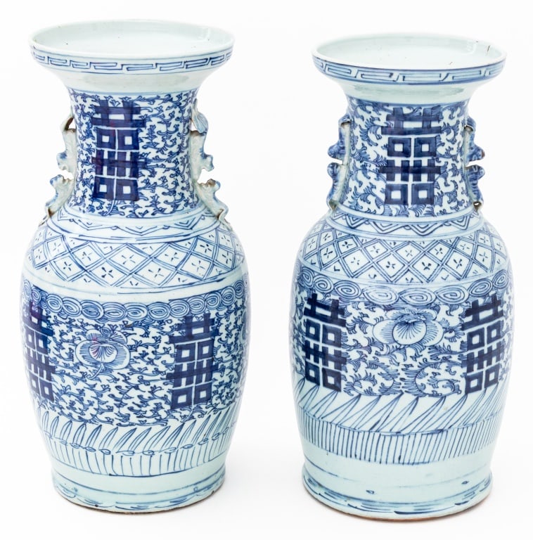 Chinese Blue and White Porcelain Baluster Vases, 2: Pair of Chinese Blue and White Porcelain Baluster Vases, each with double foo lion handles to the neck and hand-painted double happiness motif. 17" H x 9" Diameter. Provenance: From a Greenwich, Conne