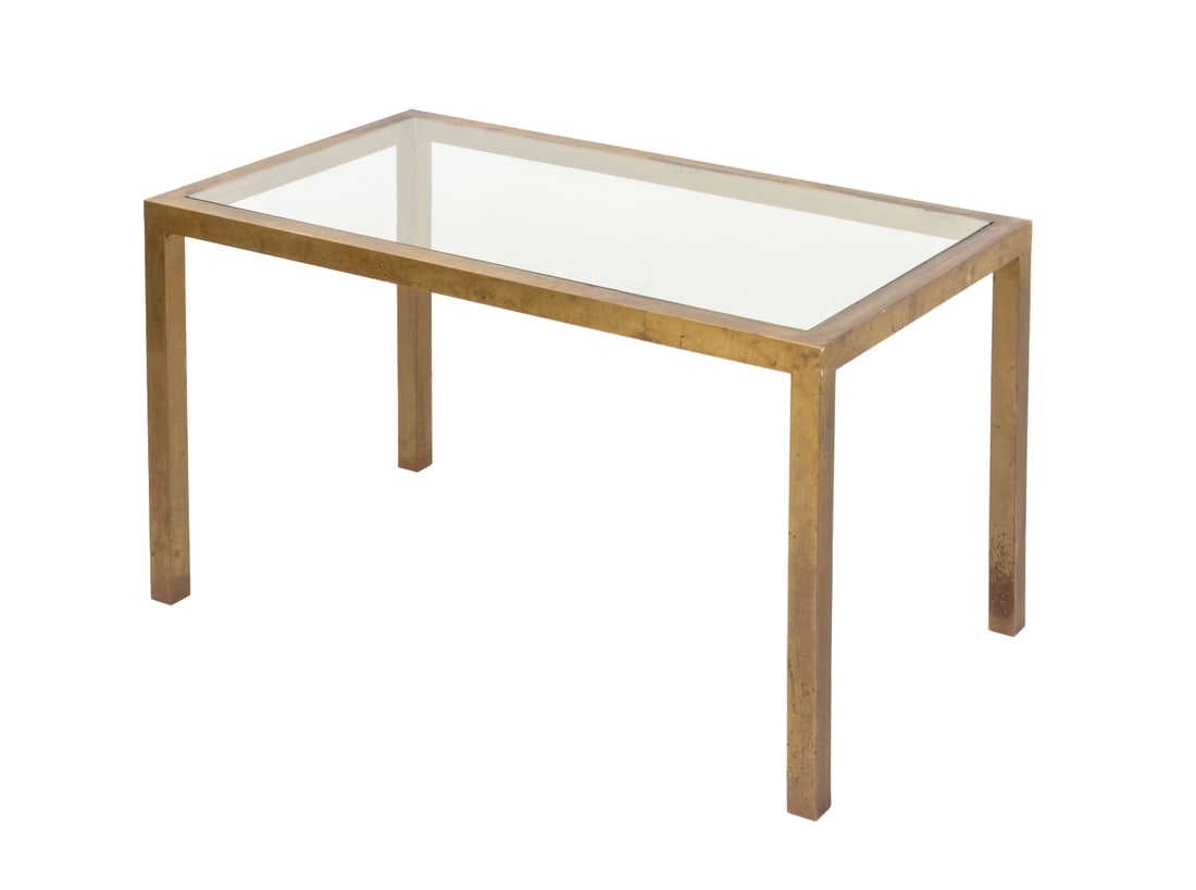 Modern Glass Top Brass Dining Table: Modern Glass Top Brass Dining Table, with rectangular glass top. 29" H x 54" W x 30" D. Provenance: From a 201 E 66th Street Estate. Keywords: Contemporary Furniture, Minimalist, Minimalism, Industria