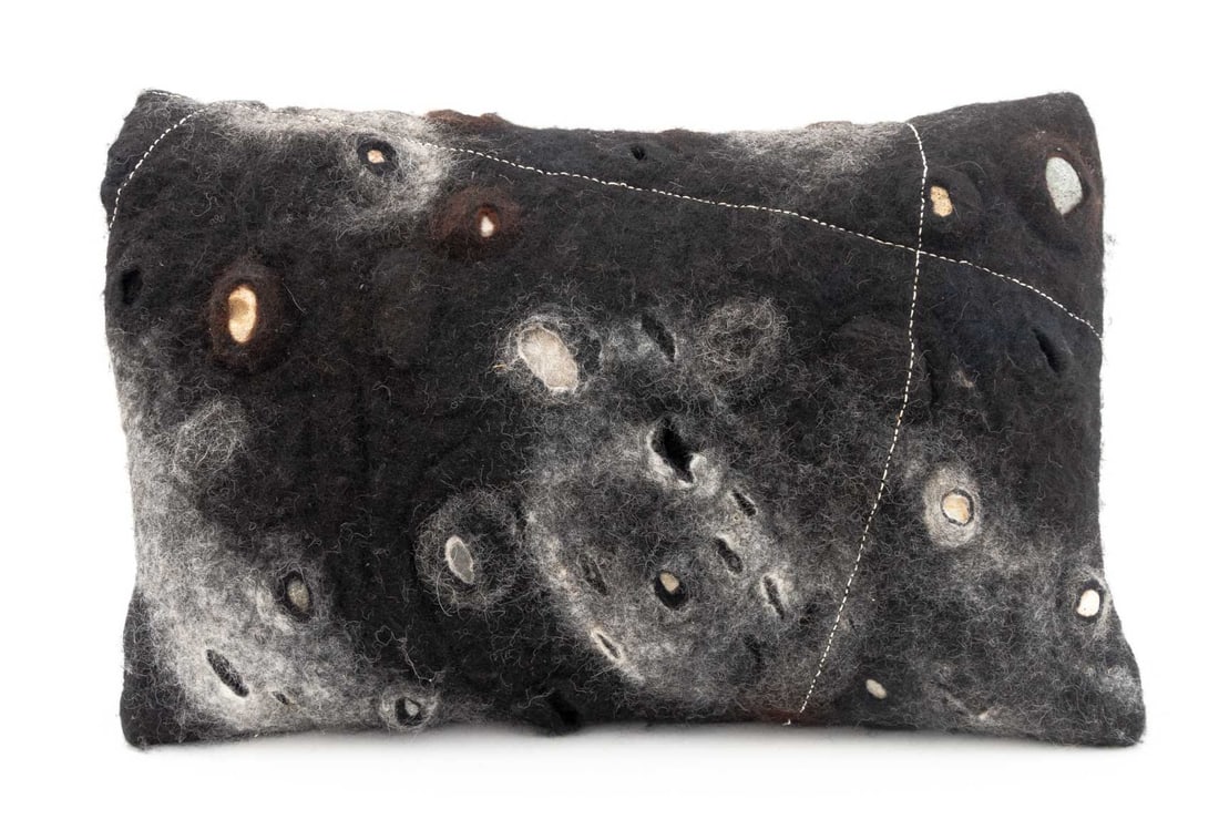 Contemporary Felted Wool Galaxy Pillow: Contemporary Felted Wool Galaxy Pillow, the stitching and felting depicting outer space abstraction with natural rocks formed into the pillow shape. 19.5" L x 13.25" W x 6" D. Provenance: From a New Y