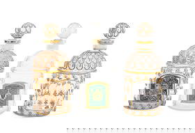 Guerlain Gilt Embossed Bee Cologne Bottles, 3: Group of Three Guerlain Gilt Embossed Bee Cologne Bottles, each with ball from stoppers, 19th century, comprising: two with gilt trim and accents, one with partially obliterated tan and black label an