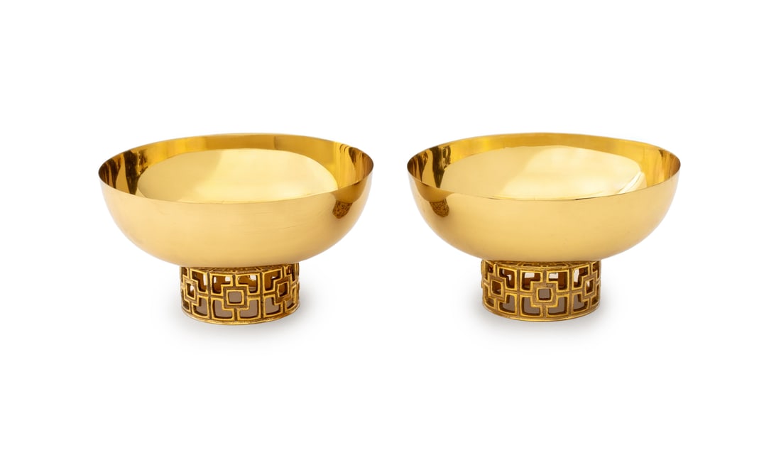 Jonathan Adler "Nixon" Gilt Centerpiece Bowls: Jonathan Adler "Nixon" Gilt Metal Footed Bowls, labels to undersides. 5" H x 9" Diameter. Provenance: From a New York City Private Collection. Keywords: Fruit bowls, Vessels, Centerpiece bowl,