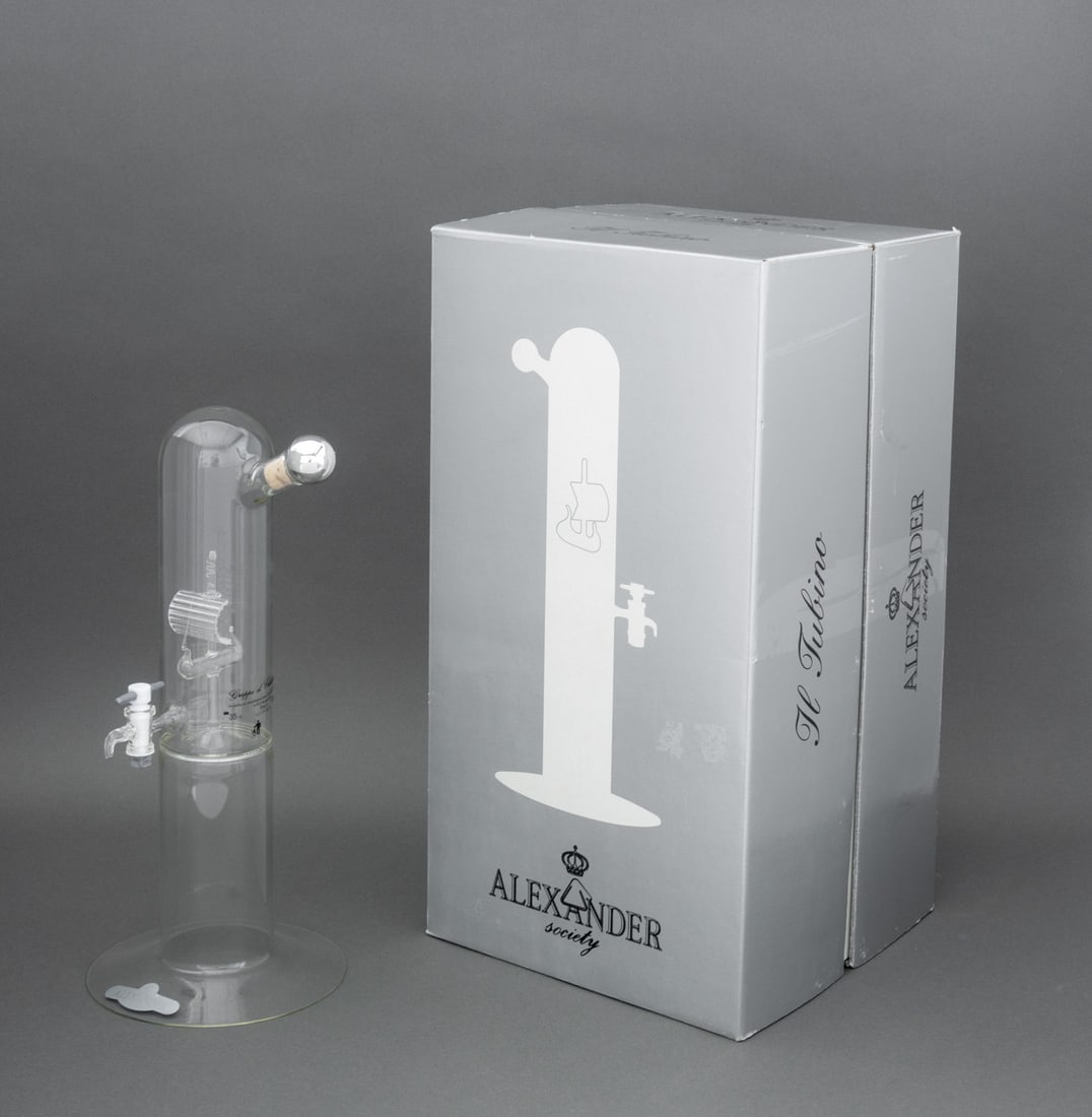 Alexander Society Glass Decanter and Dispenser: Alexander Society "Il Tubino" Glass Decanter and Dispenser, with silver-tone and cork stopper and glass ship design to the center, with "Alexander Society" label to the circular base, with original