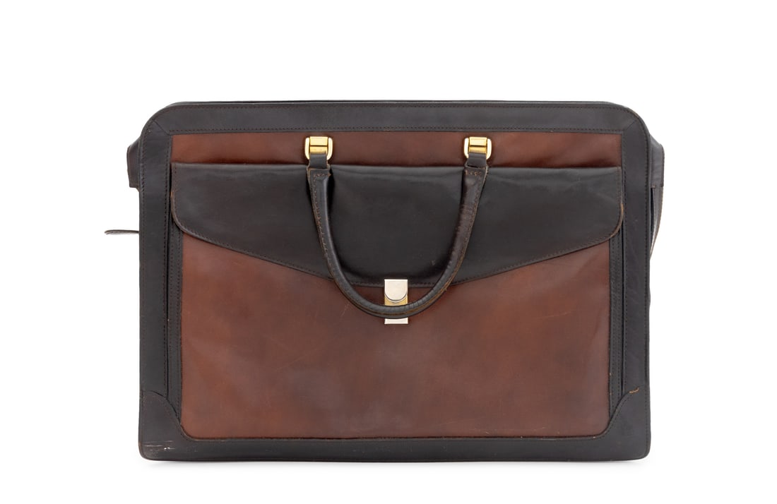 Bottega Veneta Black and Brown Leather Briefcase: Bottega Veneta Black and Brown Leather Briefcase, with front envelope pocket, the top zipper opening to divided interior with one zipper pocket, "Bottega Veneta / Made in Italy" plaque to interior. 12
