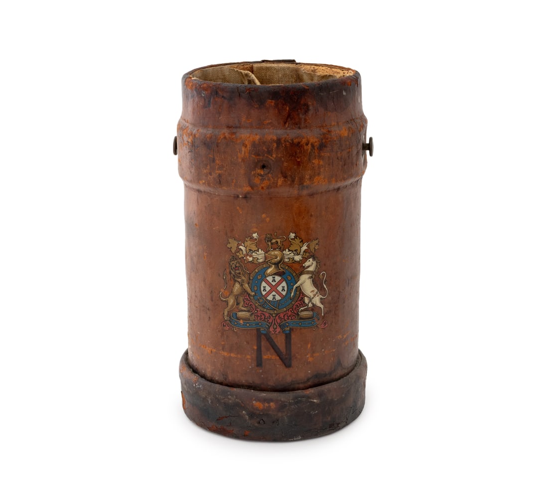 British Royal Navy Leather Cordite Bucket: British Royal Navy Leather Cordite Bucket, cylindrical with coat of arms and brandished "N" to front. 16" H x 18.5" Diameter. Provenance: From a New York City Collection. Keywords: Cordite Carrier,