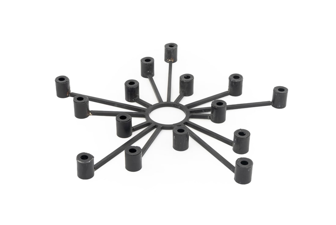 Modernist Sunburst 15-Branch Candelabrum, 1970s: Modernist Sunburst Iron 15-Branch Candelabrum, 1970s. 1.5" H x 15.75" Diameter. Provenance: From the Collection of Laura and Lewis Kruger. Keywords: Lighting, Candelabra, Candlesticks, Candleholders,