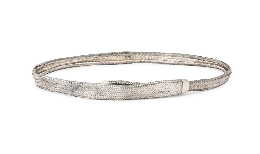 Angela Cummings Woven Sterling Silver Belt: Angela Cummings Woven Sterling Silver Belt, the buckle marked "(c) 1984 (c) 1985 / Cummings Sterling" to reverse. Weight: 6.90 ozt.; 42" L x 1" W. Provenance: From the Estate of American Fashion Journ