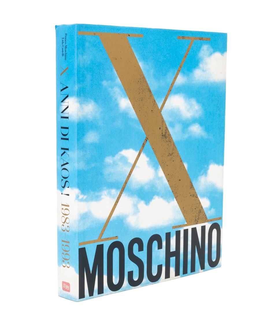 Signed "Moschino: X Anni Di Kaos! 1983-1993": Foroni, Mauro, "Moschino: X Anni Di Kaos! 1983-1993", Milan: Edizioni Lybra Immagine, 1993, signed and inscribed by Franco Moschino on half-title page. 13.25" L x 10" W x 1.5" D. Provenance: From the