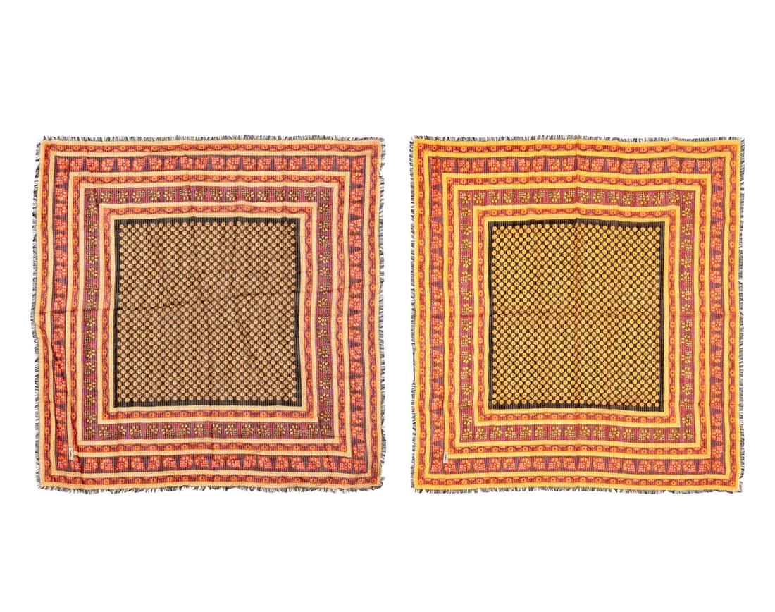 Yves Saint Laurent Cotton Scarves, Pair: Pair of Yves Saint Laurent Cotton Floral Patterned Scarves, with yellow flowers on black ground, surrounded by yellow, orange and purple floral border with silver and gold thread, marked "YSL" in prin