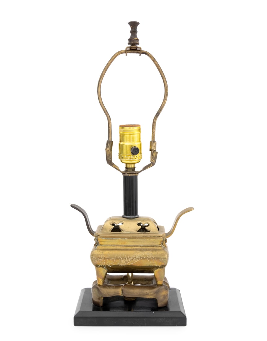 Chinese Brass Censer Mounted as a Table Lamp: Chinese Brass Censer Mounted as a Table Lamp, the covered censer with etched dragon motif and mounted atop an ebonized wood base. 17.25" H x 7.25" W x 4.5" D. Provenance: From the Estate of American F