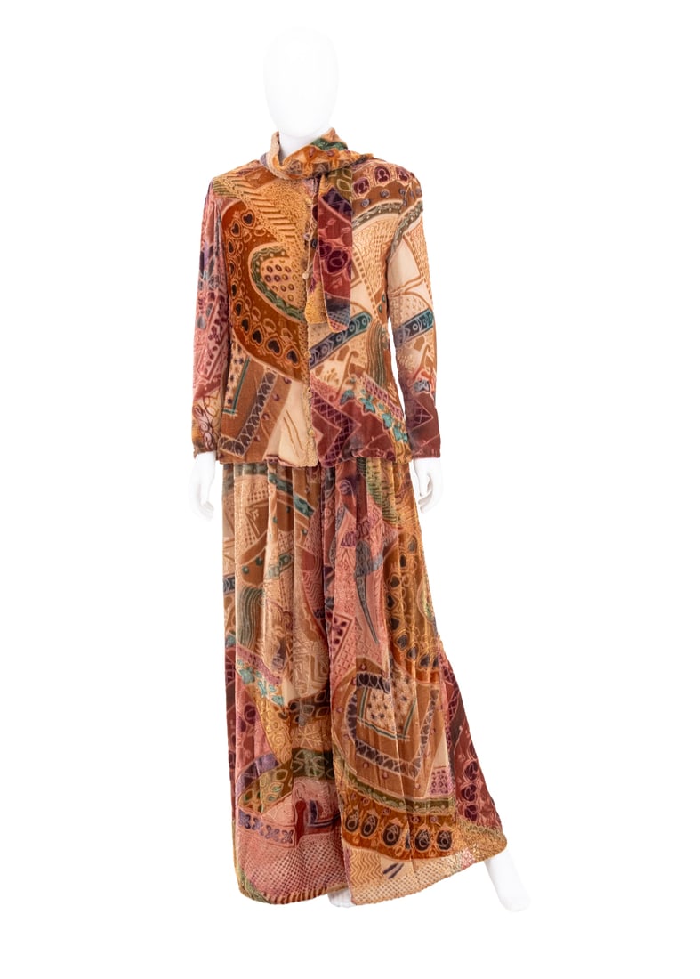 Bill Blass Velvet Ensemble, 2 Pcs.: Bill Blass Velvet Two-Piece Pant Set, with abstract multi-colored pattern, comprising: long sleeve button down shirt with neck scarf and wide-leg pants, "Bill Blass, Made in U.S.A. / imported fabric"