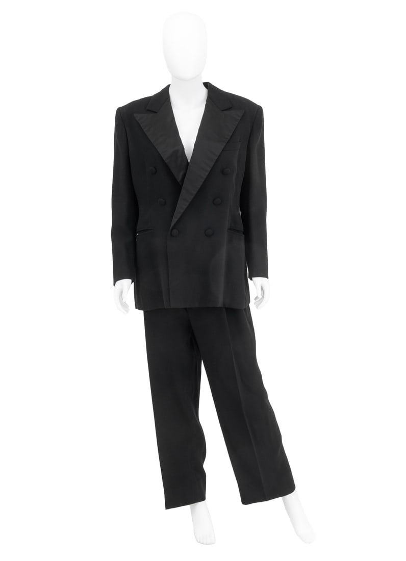 Ralph Lauren Black Wool Pant Suit Set, 2 Pcs.: Two-Piece Ralph Lauren Black Wool Womens Pant Suit Set, comprising jacket with silk lined interior and lapel, six buttons and two front pockets with matching pants, "Ralph Lauren / Made in U.S.A." lab