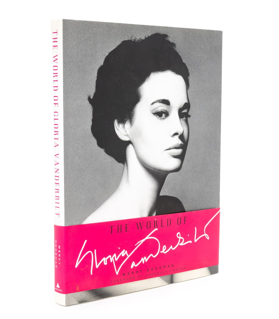 Signed "The World of Gloria Vanderbilt" Book, 2010: Goodman, Wendy, "The World of Gloria Vanderbilt", New York: Abrams, 2010, signed and inscribed by Gloria Vanderbilt on flyleaf. 12.25" L x 9.5" W x 1" D. Provenance: From the Estate of American Fashio