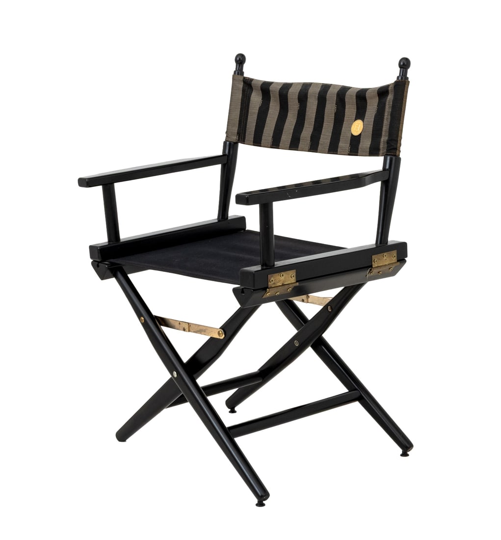 Fendi Ebonized Wood Director's Chair: Fendi Ebonized Wood Director's Chair, the collapsible frame with X-form stretcher and striped cotton Fendi backrest, embroidered "Bill" with "Fendi" logo to the front. 33" H x 18.5" W x 16" D; seat: 1
