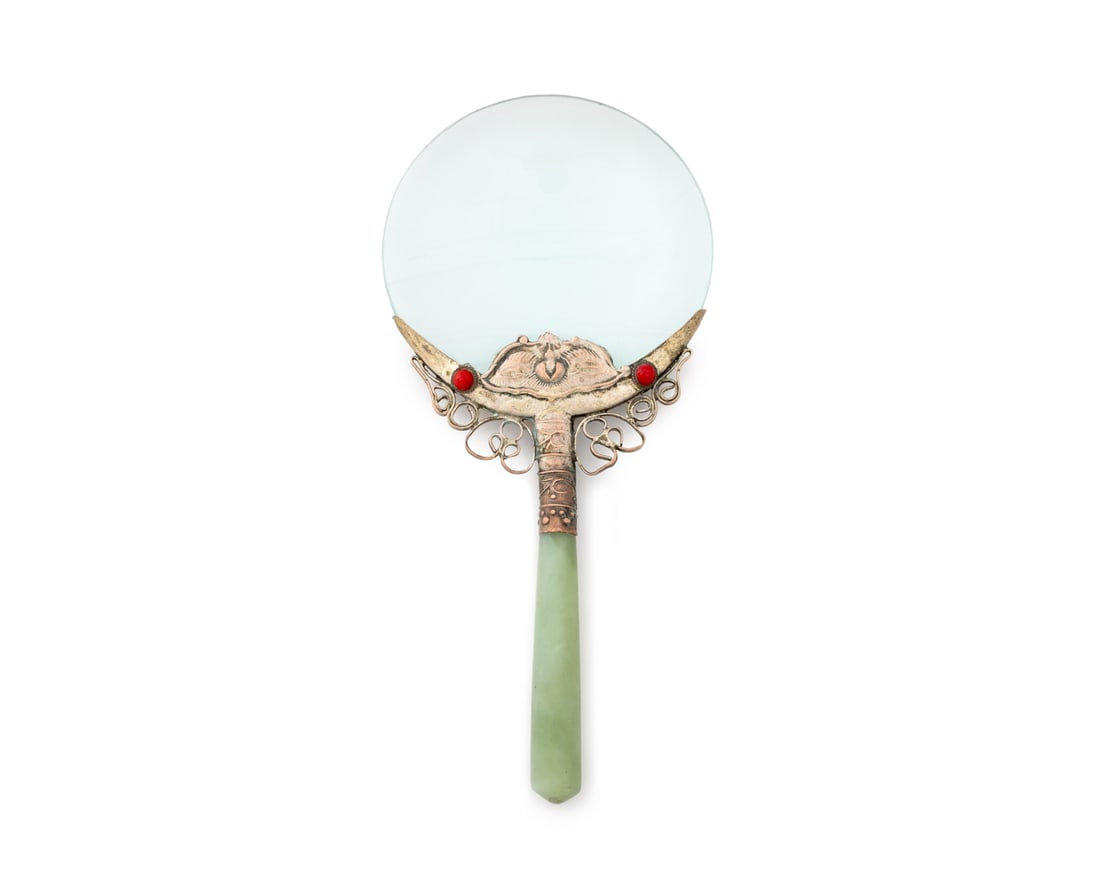 Chinese Jade Handled Magnifying Glass: Chinese Jade Handled Magnifying Glass, the silvered metal mount with si bat matif and four red cabochons. 7" H x 3.25" W x 0.5" D. Provenance: From the Estate of American Fashion Journalist and Editor