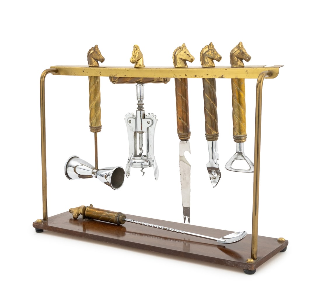English Brass Horse Head Motif Bartender Set: English Brass Horse Head Motif Bartender Set, with three bottle openers, one with blade marked "Blade made in / Sheffield England / Stainless steel", a jigger, corkscrew wine opener, and a cocktail sp