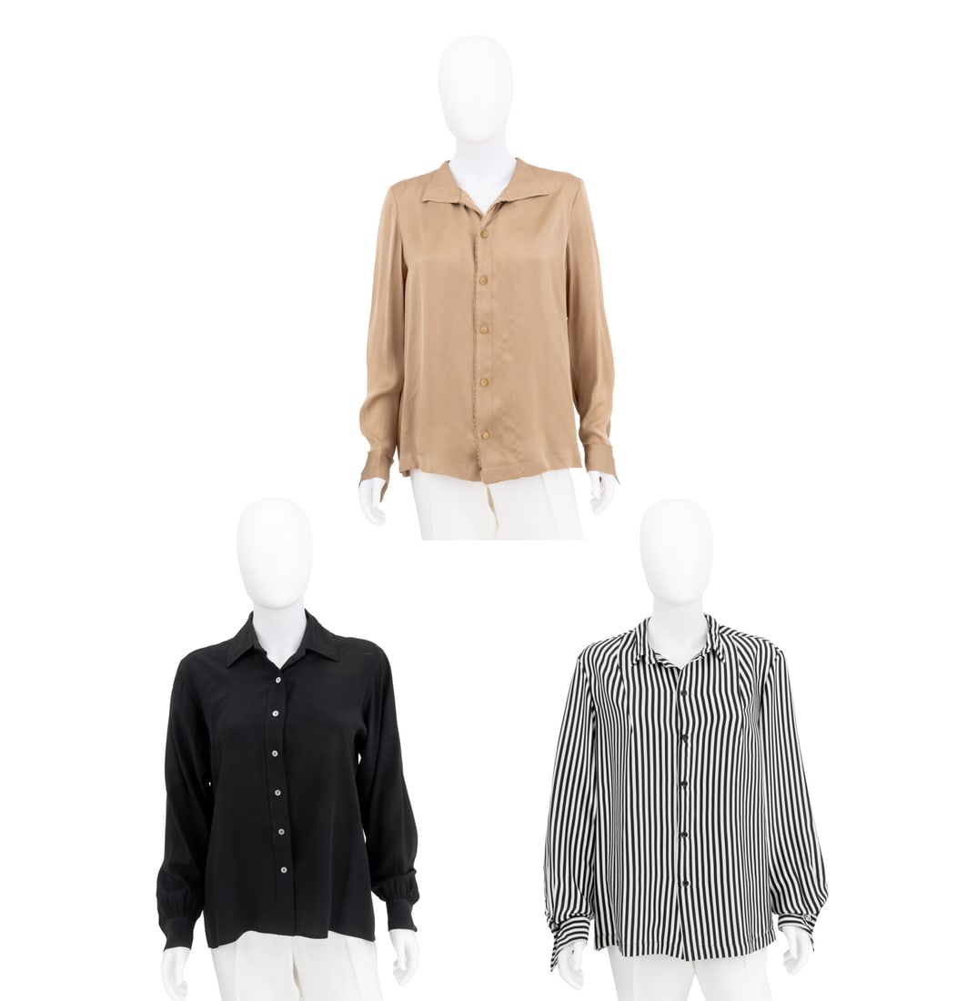 Joan Vass, Etc. Silk Button Down Blouses, 3: Three Silk Button Down Blouses, comprising: Joan Vass black and white stripes, Joan Vass beige with intentional frayed edges, each with "Joan Vass / N.Y." labels and black with banded cuffs, unmarked.