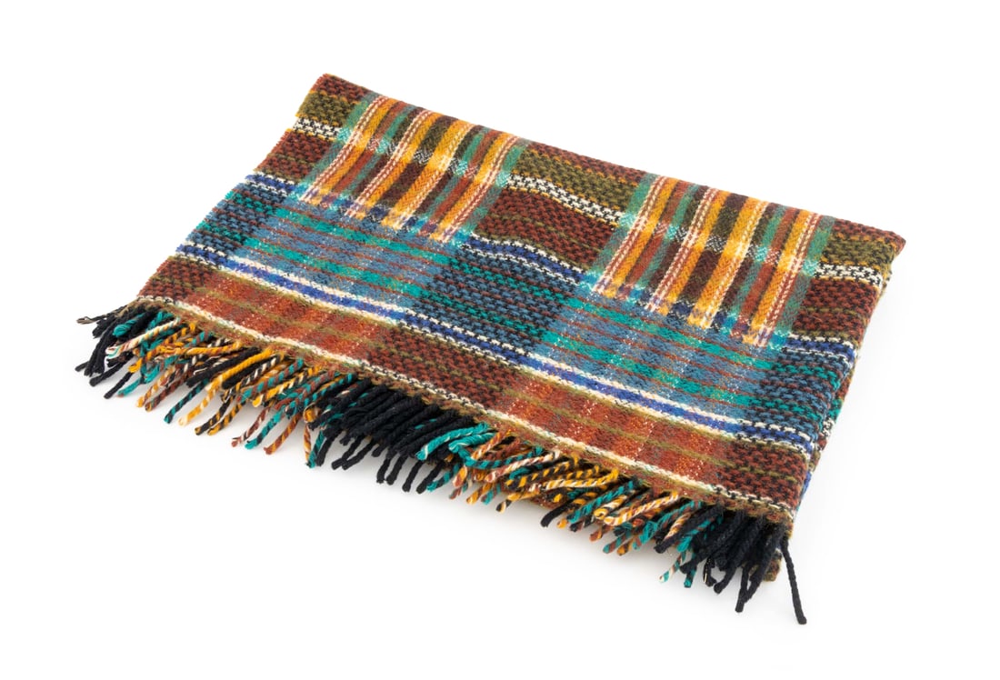 Missoni Masters Wool Throw Blanket: Missoni Masters Wool Throw Blanket, designed by T&J Vestor with multicolored geometric pattern, "Missoni Masters / by / T&J Vestor" label. 66" L x 53" W. Provenance: From the Estate of American