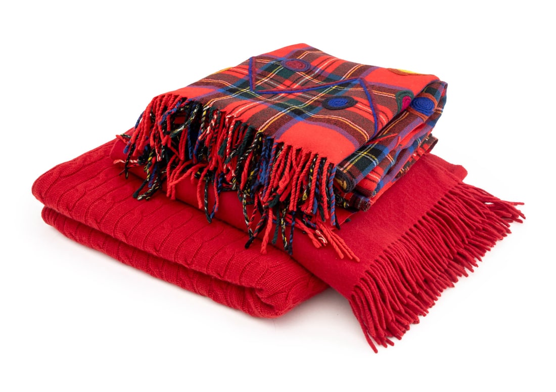 Ralph Lauren, Etc. Designer Throw Blankets, 3: Group of Three Designer Throw Blankets, comprising: Ralph Lauren red cashmere cable knit pattern blanket, "Ralph Lauren" label, Sferra Bros red cashmere throw, "Sferra Bros / Made in German" label,