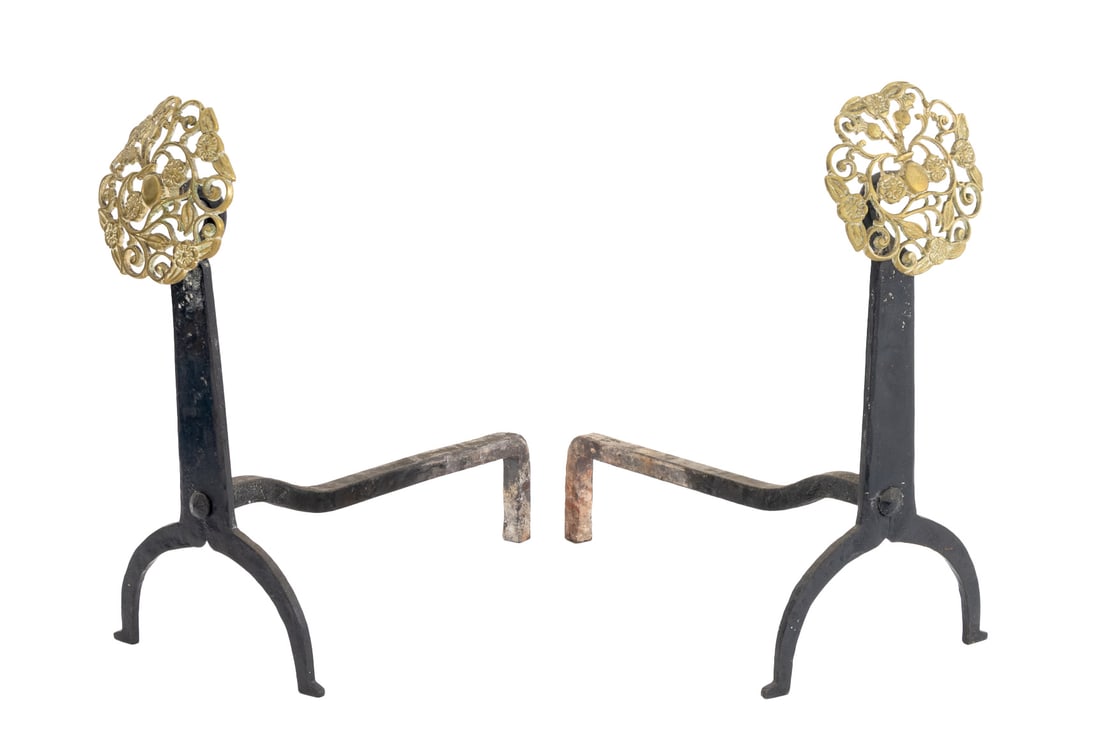 European Pierced Brass Andirons, Pair: Pair of European Pierced Brass Andirons, late 19th Century, with circular foliate design to the head. 18" H x 9" W x 16.5" D. Provenance: From the Estate of American Fashion Journalist and Editor-in-C