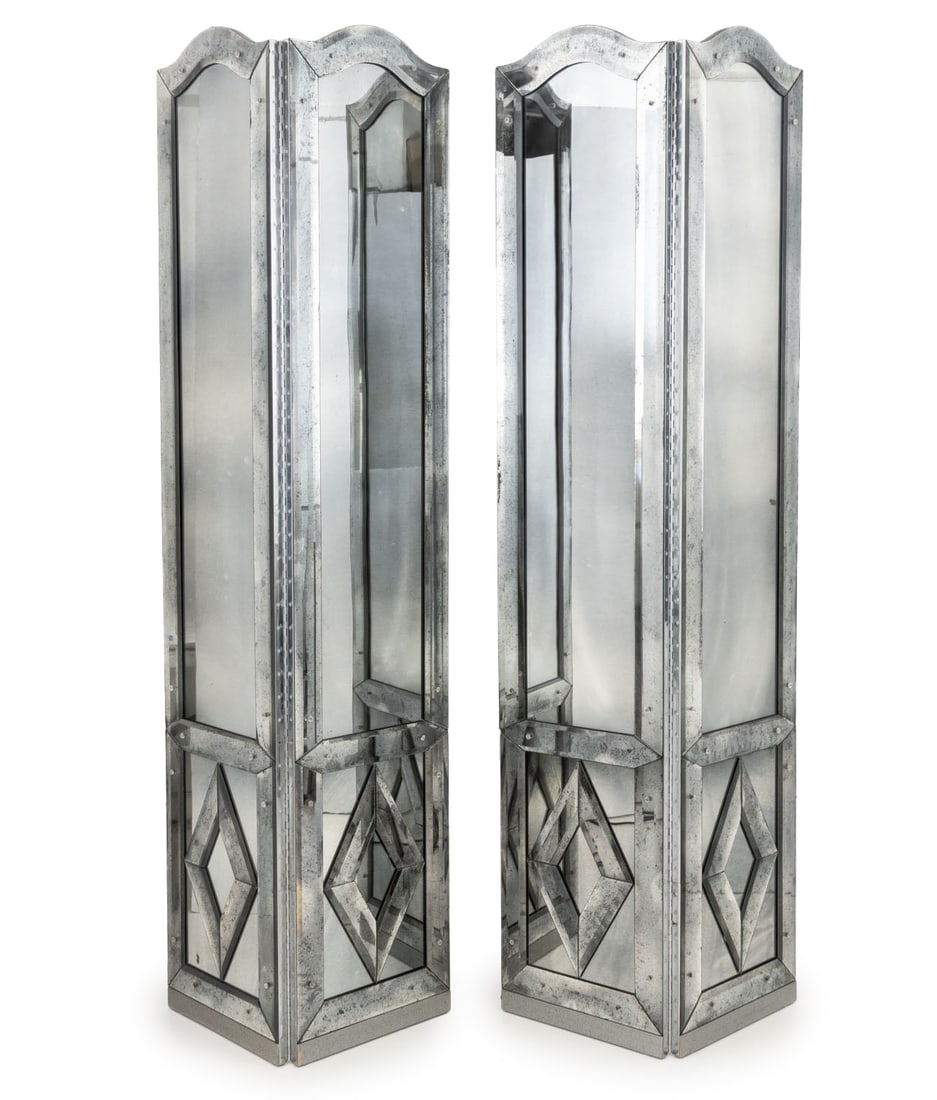 Art Deco Style Mirrored Folding Screens, Pair: Pair of Art Deco Style Mirrored Folding Screens, the top with arched frame above geometric mirrored design. 90" H x 36" W x 1" D; each panel: 18" W. Provenance: From a 422 East 72nd Street Estate.