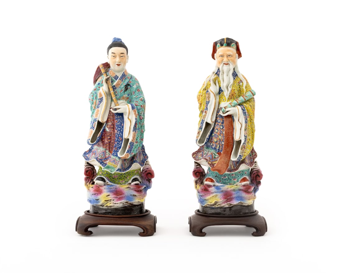 Chinese Glazed Porcelain Figural Sculptures, 2: Group of Two Chinese Glazed Porcelain Figural Sculptures, comprising: sage and scholar, each mounted on carved wood base. Overall: 15.25" H x 6" W x 6" D. Provenance: From an East 72nd Street Estate.